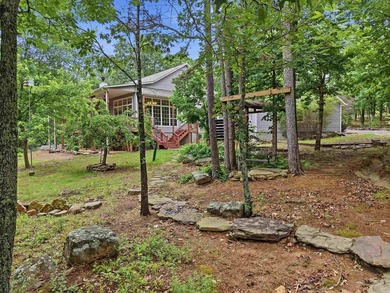 Tucked away in the Ozarks on 40 breathtaking acres, this - photo 40