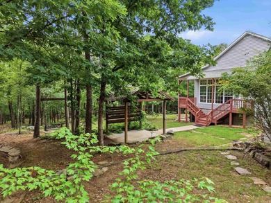Tucked away in the Ozarks on 40 breathtaking acres, this - photo 41