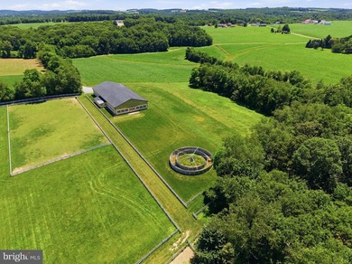 An incomparable equestrian estate unfolds across 9981 & 10215 - photo 9