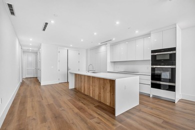 Indulge in the elegance of resort-style waterfront living in - photo 13