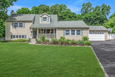 Beautifully updated 4-bedroom, 4-full-bath Expanded Split set on - photo 1