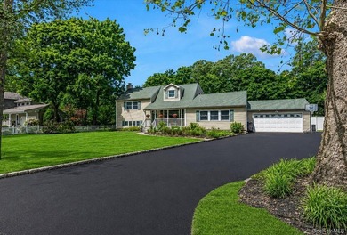 Beautifully updated 4-bedroom, 4-full-bath Expanded Split set on - photo 2