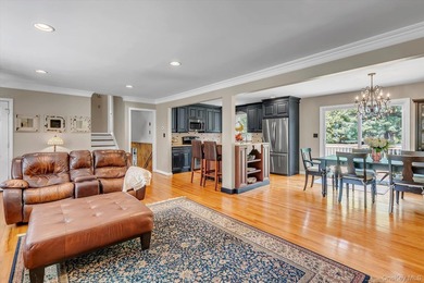 Beautifully updated 4-bedroom, 4-full-bath Expanded Split set on - photo 3