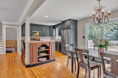 Beautifully updated 4-bedroom, 4-full-bath Expanded Split set on - photo 6