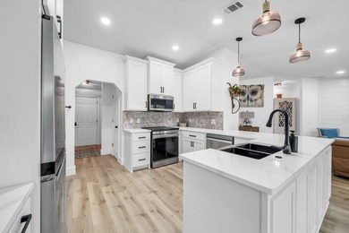 Finding a beautifully renovated home isn't difficult. Finding - photo 3