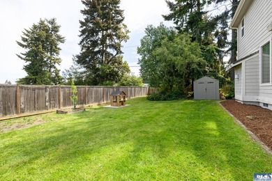 Tucked beyond a paved driveway and framed by crosswood fencing - photo 14