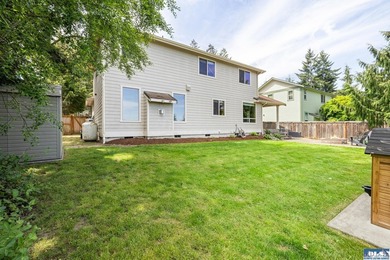 Tucked beyond a paved driveway and framed by crosswood fencing - photo 15