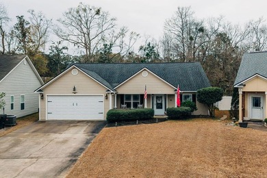 Welcome to this charming 3-bedroom, 2-bathroom home featuring a - photo 1