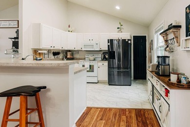 Welcome to this charming 3-bedroom, 2-bathroom home featuring a - photo 8
