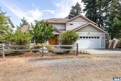 Tucked beyond a paved driveway and framed by crosswood fencing - photo 39