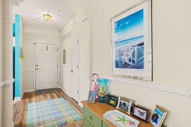 Welcome to this bright and beachy 2-bedroom, 2-bath end-unit - photo 3