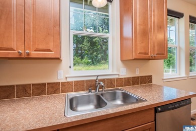 A beautifully updated and lovingly cared for townhouse, this - photo 14