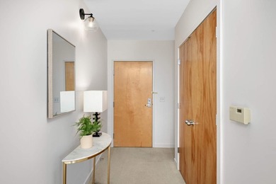 This stylish two story loft offers modern living with all the - photo 3