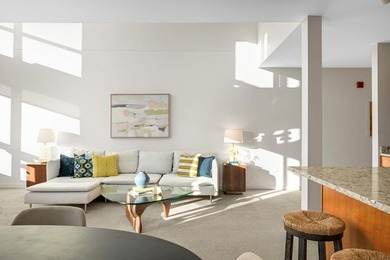This stylish two story loft offers modern living with all the - photo 6