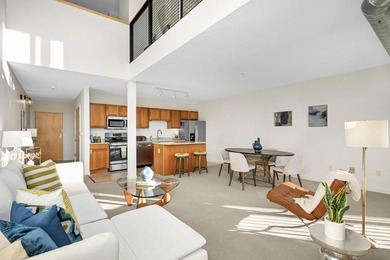 This stylish two story loft offers modern living with all the - photo 8