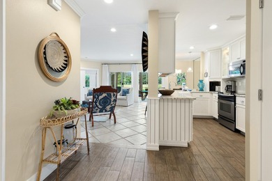 This highly sought-after condominium offers the perfect blend of - photo 2