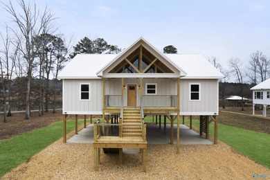 Beautiful 3BR/2.5BA elevated home with just over 1700 square - photo 2