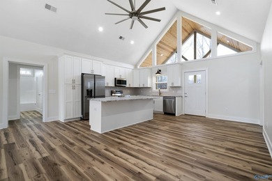 Beautiful 3BR/2.5BA elevated home with just over 1700 square - photo 4