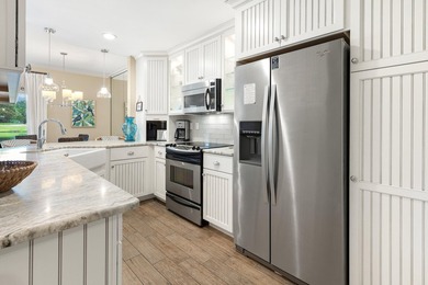This highly sought-after condominium offers the perfect blend of - photo 6