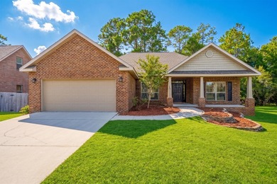 Set on a huge 0.52 acre lot with peaceful forest views, this - photo 1