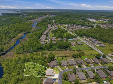 Set on a huge 0.52 acre lot with peaceful forest views, this - photo 3