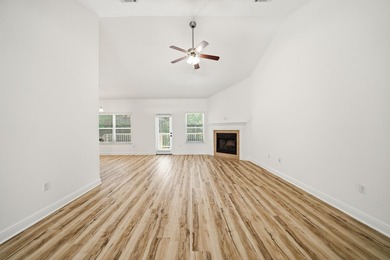 Set on a huge 0.52 acre lot with peaceful forest views, this - photo 6