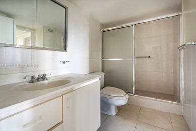 Just steps from the sand, this large 736 sqft 1-bedroom condo at