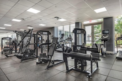 Just steps from the sand, this large 736 sqft 1-bedroom condo at