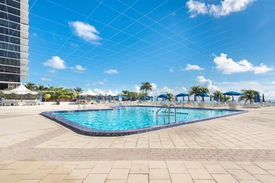 Just steps from the sand, this large 736 sqft 1-bedroom condo at
