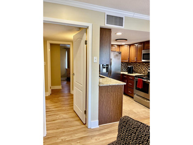 Beautifully remodeled 2-bedroom, 1 bath condo in sought after - photo 6