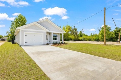 Welcome home to this beautiful new construction, never lived in - photo 1