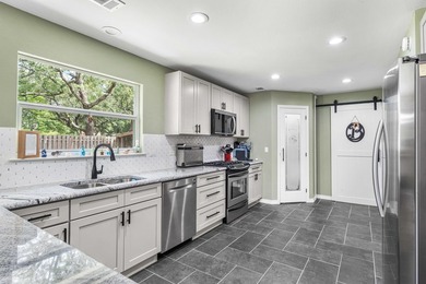 Beautifully renovated home tucked away on a quiet cul-de-sac in - photo 7