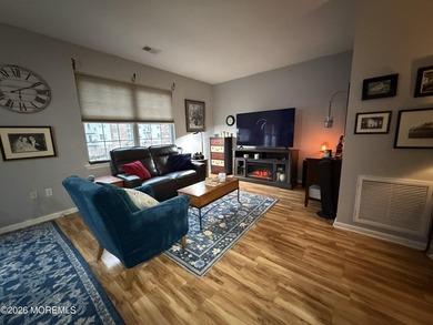 Move right into this bright 3rd-floor end-unit condo in the