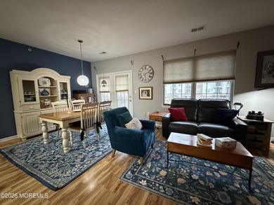 Move right into this bright 3rd-floor end-unit condo in the
