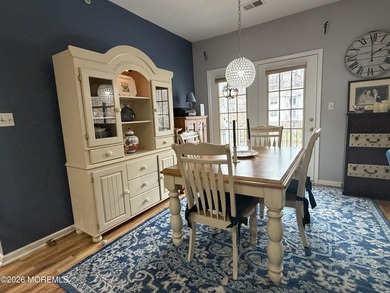 Move right into this bright 3rd-floor end-unit condo in the