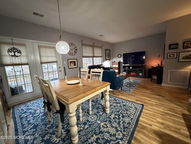 Move right into this bright 3rd-floor end-unit condo in the