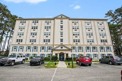 Fully remodeled unit with a lovely pond view in the heart of the - photo 1