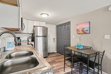 Fully remodeled unit with a lovely pond view in the heart of the - photo 6