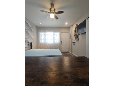 This charming studio condo offers an ideal blend of - photo 3