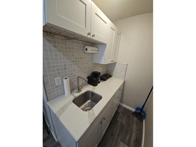 This charming studio condo offers an ideal blend of - photo 4