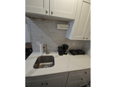 This charming studio condo offers an ideal blend of - photo 5