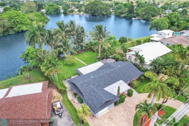 Lake Home For Sale in Palm Springs, Florida
