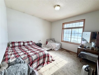 This beautifully designed patio home features an open-concept