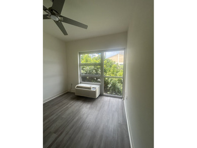 Corner unit, Overlooks a mini park, LVT throughout Enjoy this is - photo 11