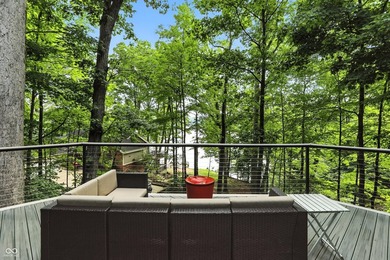 Beautiful view of Lamb Lake on 1.58 wooded acres. Nicely updated - photo 2