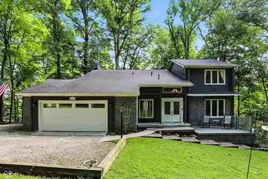 Beautiful view of Lamb Lake on 1.58 wooded acres. Nicely updated - photo 6