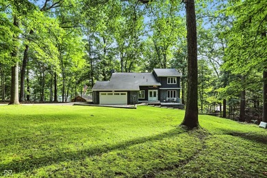 Beautiful view of Lamb Lake on 1.58 wooded acres. Nicely updated - photo 10