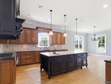 Exceptional lakefront residence situated on a premier double lot - photo 12