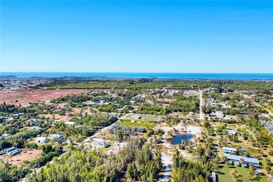 Agricultural-zoned vacant lot in St. James City with residential - photo 8