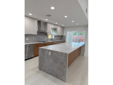 A MUST SEE COMPLETELY RENOVATED HOME 4 BEDROOMS 3 BATHS, ITALIAN - photo 3